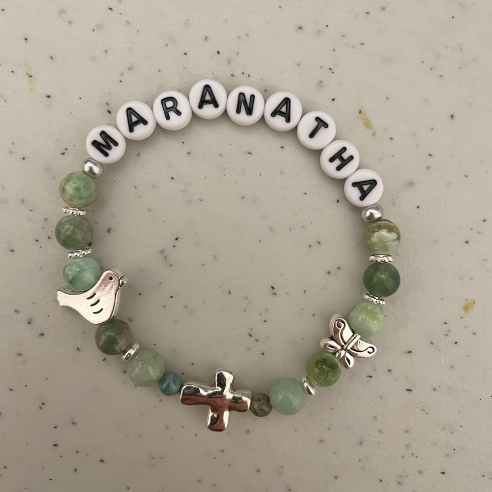 Beautiful handmade Green and silver Beaded Bracelet with Charms. Glass beads.